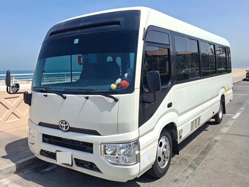 30 passenger bus rental rates in Dubai or Sharjah
