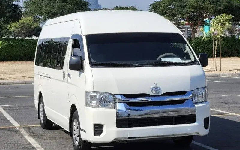13 seater van rental with driver Sharjah for group transport